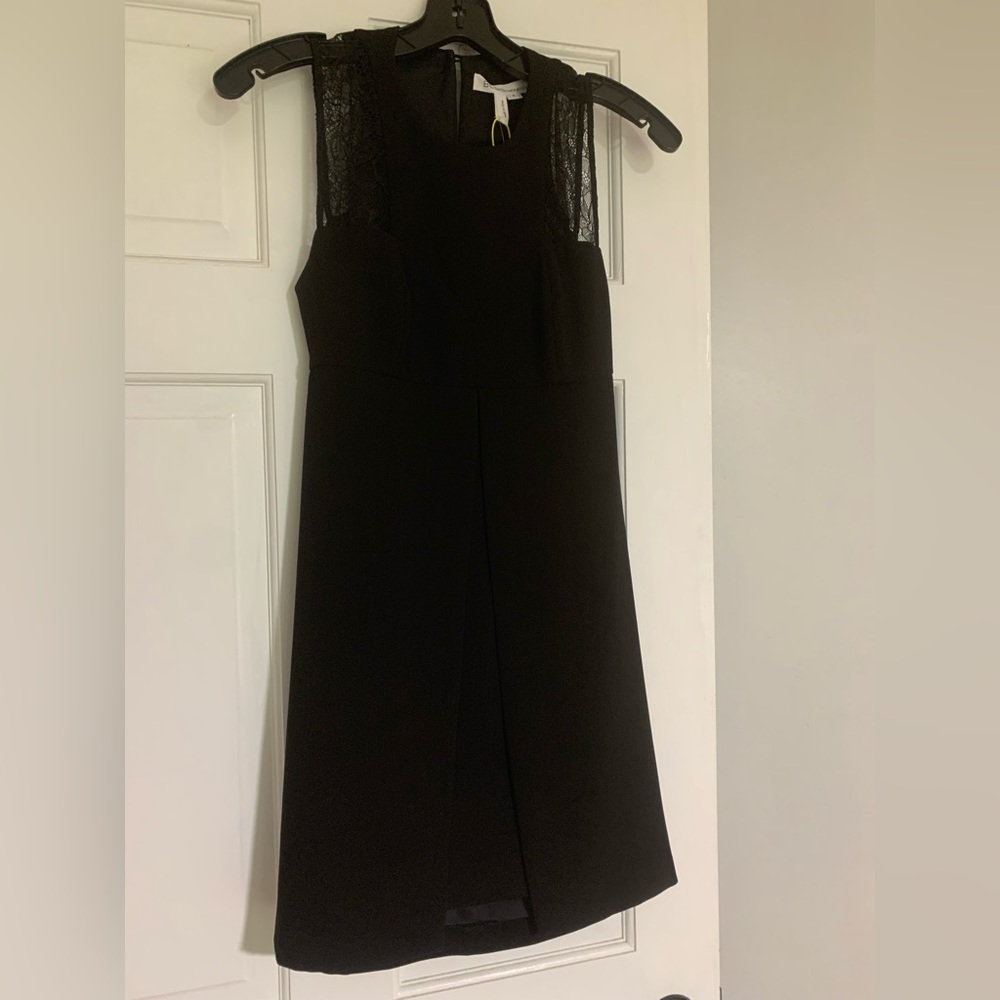 BCBGeneration black dress with cutout back NWT